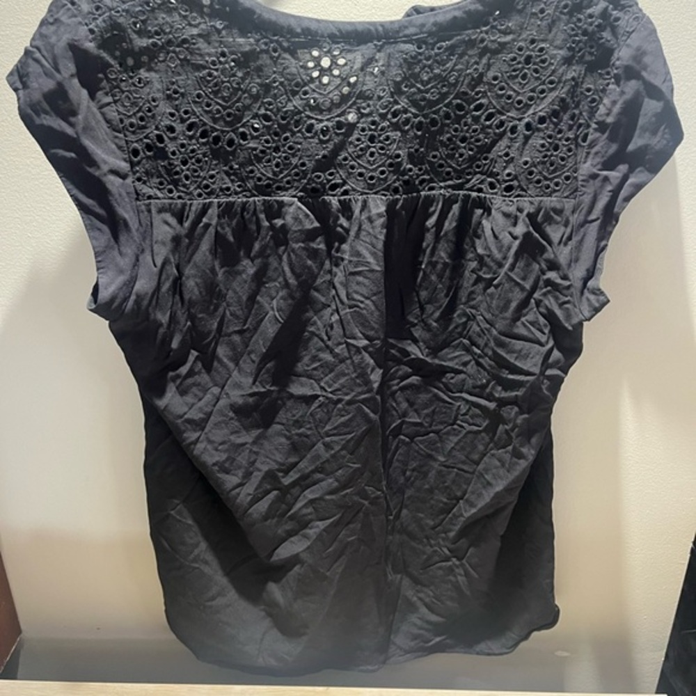 Daniel Rainn top